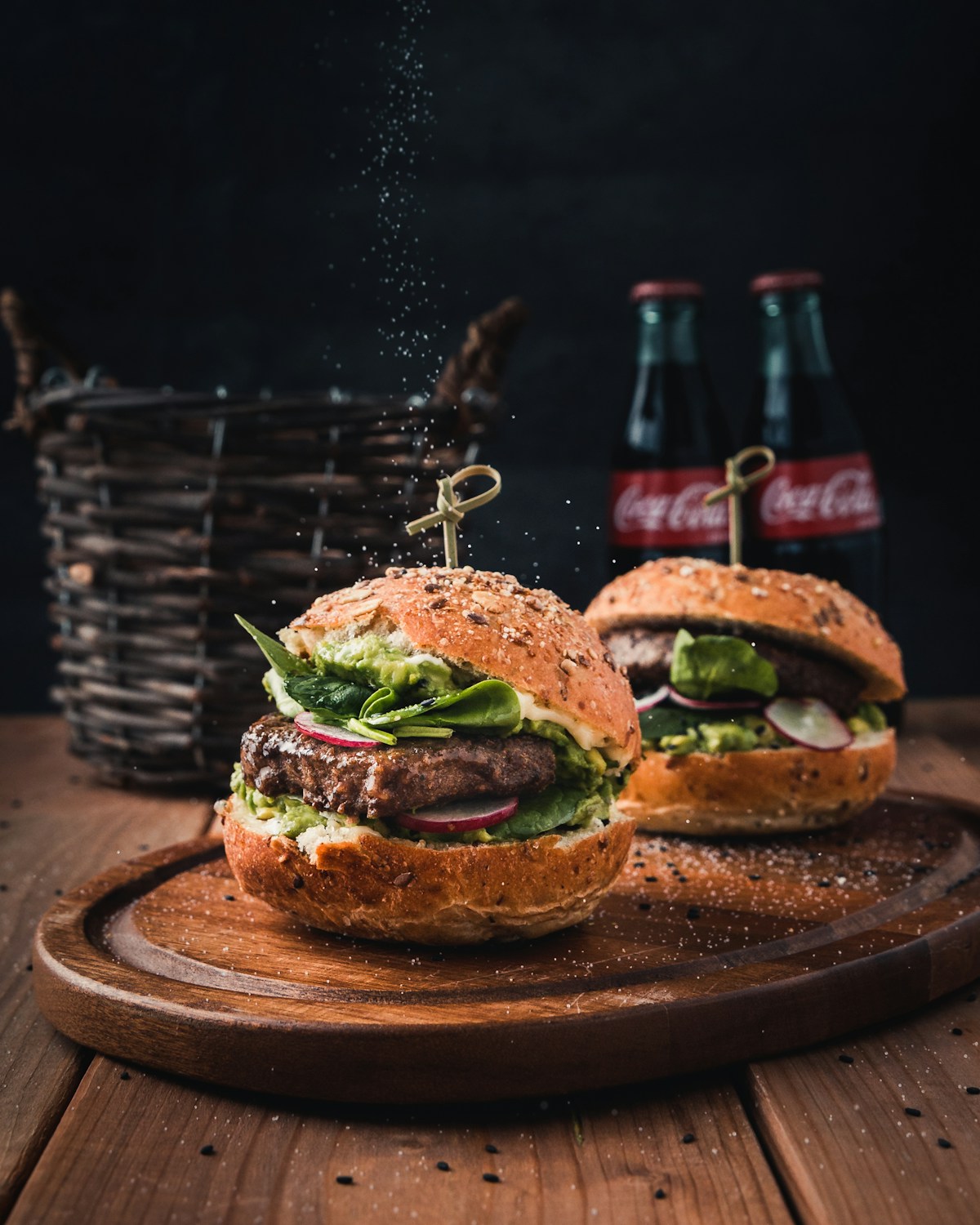 Homemade burgers on a wooden board